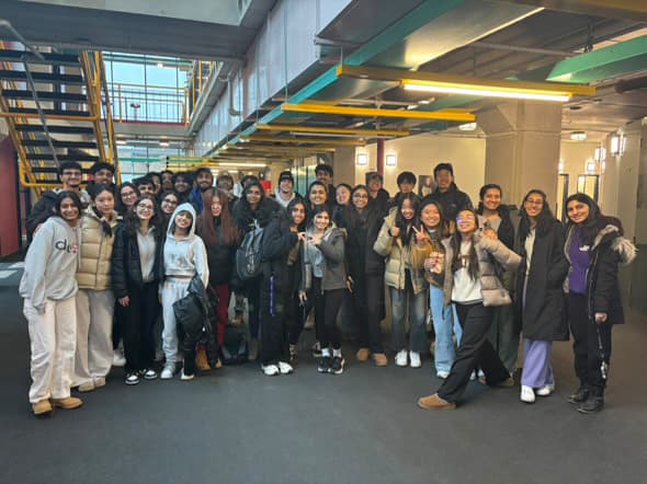 MGTE class group photo in hallway