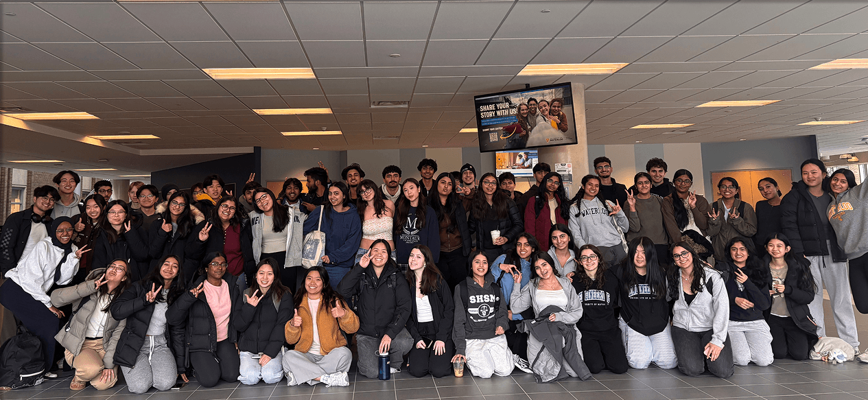 MGTE class group photo in lobby