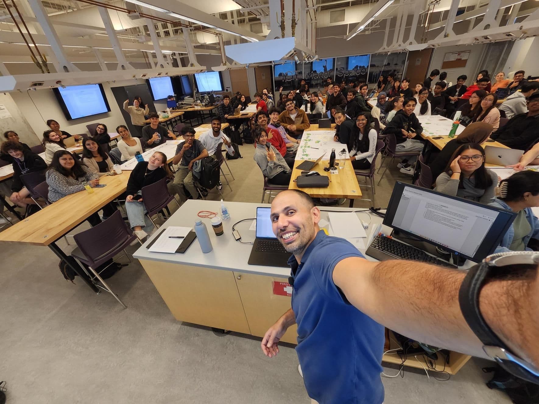 Professor selfie with class in makerspace