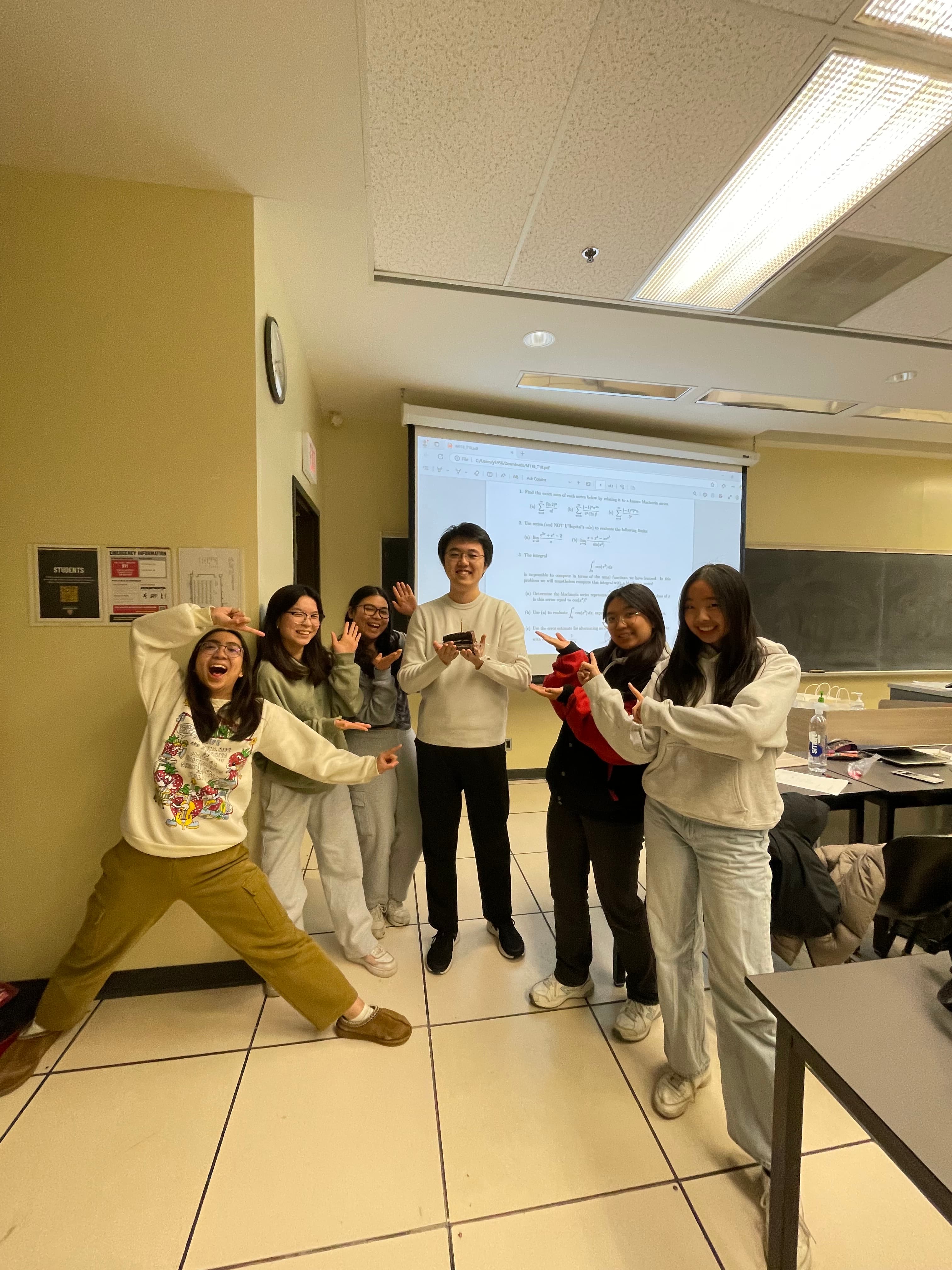 Group posing in tutorial classroom